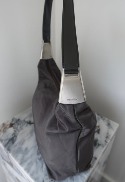 vintage prada bag with metal handle